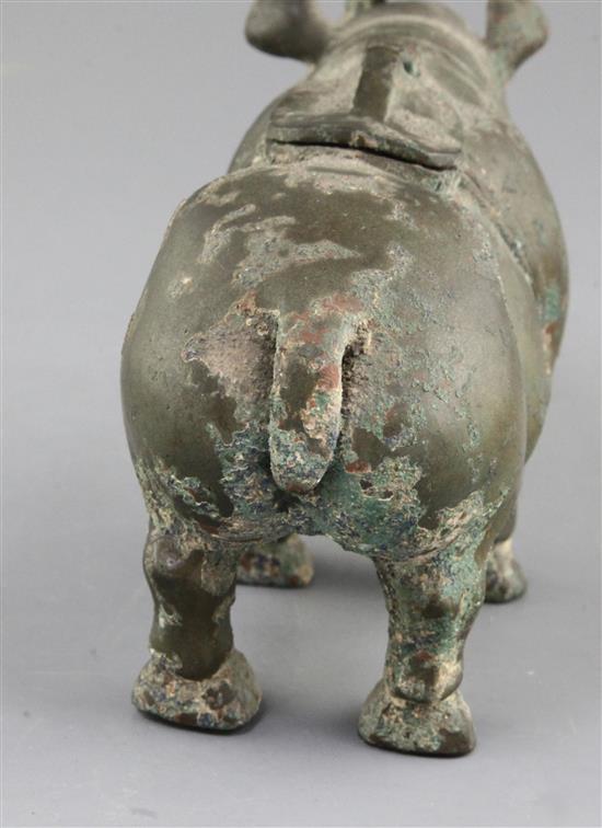 A rare Chinese archaic bronze ritual rhinoceros wine vessel, Zun, early Western Han dynasty, 206 B.C. - 9 A.D. 11.8cm high, 21cm long